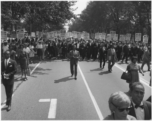 black and white historical image of protest march